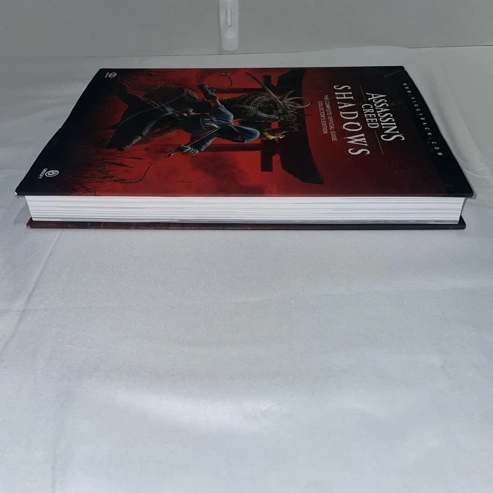 Assassins Creed Shadows Official Guide Collectors Edition Piggyback Hardcover